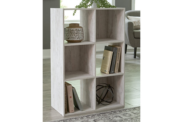 If it’s coastal chic or cottage quaint style you long for, the Paxberry whitewashed six-cube organizer invites you to go to town. Its distinctive weatherworn finish conveys an easy-breezy sensibility, perfect for a restful bedroom retreat. Open and closed backs make it abundantly practical.Made with engineered wood (MDF/particleboard) and decorative laminate | Whitewash replicated worn through paint with authentic touch | Can be used vertically or horizontally | Accommodates any 10.5W x 10.5D x 11H storage bin | Assembly required | Estimated Assembly Time: 20 Minutes