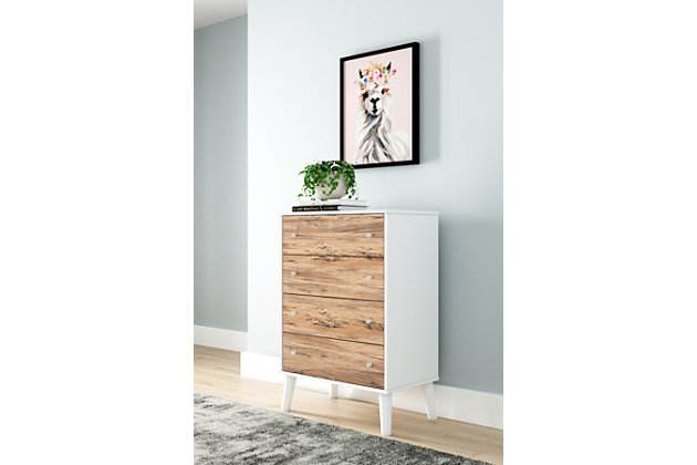 The perfect marriage of contemporary and casual style, the Piperton four-drawer chest is a charming addition to your home. This chest is expressive with its two-tone look in a solid matte white finish and a replicated sugarberry wood grain pattern. Ball bearing glides offer smooth opening and closing of the drawers, while white knobs and splay legs add a finishing touch. Made of engineered wood and decorative laminate | Matte white finish | Replicated sugarberry wood grain pattern | 4 smooth-gliding drawers with vinyl wrapped sides and back | White knobs | Splay legs | Safety is a top priority, clothing storage units are designed to meet the most current standard for stability, ASTM F 2057 (ASTM International) | Drawers extend out to accommodate maximum access while maintaining safety | Assembly required | Estimated Assembly Time: 50 Minutes