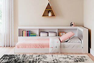 The Piperton twin bookcase storage bed is an inspired find, beautifully blending contemporary and casual style. Its two-tone look in matte white and a replicated sugarberry wood grain pattern keep things simple, while the bookshelf storage creates added function. This charming storage bed also offers slim-profile dual USB chargers and requires no additional foundation.Includes bookcase storage with side and end rails | Made with engineered wood (MDF/particleboard) and decorative laminate | Matte white finish | No additional foundation/box spring needed | Mattress sold separately   | Slim-profile dual USB chargers in headboard | Power cord included; UL Listed | Assembly required | Estimated Assembly Time: 57 Minutes