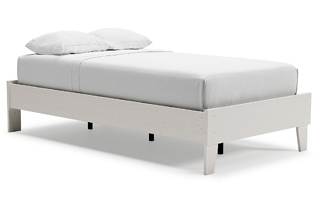 Fresh and inviting, the Vaibryn twin platform bed is truly versatile. A crisp white painted finish with a subtle replicated wood grain brings light to your room. With no additional foundation required, this bed is a lively addition that will brighten your space in a snap.Includes footboard, rails and platform | Made of engineered wood and decorative laminate | White painted finish with a subtle replicated wood grain | No additional foundation/box spring needed | Mattress sold separately | Assembly required | Estimated Assembly Time: 30 Minutes