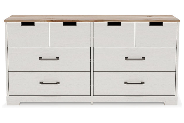 Fresh and inviting, the Vaibryn dresser is truly versatile. A crisp white painted finish with a subtle replicated wood grain brings light to your room, while a warm brown finish accents the top. Design details include metal cut-out openings along the upper drawers, with the lower drawers paired with metal handles in an antiqued nickel-tone finish. Six smooth-gliding drawers provide plenty of storage, so there's no excuse for a messy room.Made with engineered wood (MDF/particleboard) and decorative laminate | White painted finish with subtle replicated wood grain | Top with warm brown finish over replicated elm wood grain | 6 smooth-gliding drawers with vinyl-wrapped sides and back | Top drawers with metal detailed openings | Lower drawers with metal handles in antiqued nickel-tone finish | Safety is a top priority, clothing storage units are designed to meet the most current standard for stability, ASTM F 2057 (ASTM International) | Drawers extend out for maximum interior access while maintaining safety | Assembly required | Estimated Assembly Time: 50 Minutes