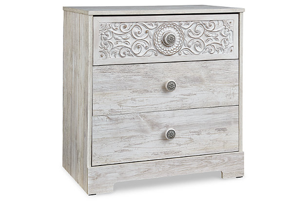 If it’s coastal chic or cottage quaint style you long for, the Paxberry whitewashed chest of drawers invites you to go to town. Its distinctive weatherworn finish conveys an easy-breezy sensibility, perfect for a restful bedroom retreat. Rest assured, tastefully edited lines and medallion drawer pulls give this attractively priced chest a high-end aesthetic.Made of engineered wood and decorative laminate | Whitewash replicated worn through paint with authentic touch | Hardware features a worn-through painted effect | 3 spacious smooth-gliding drawers; vinyl wrapped sides and back for extra durability | Safety is a top priority, clothing storage units are designed to meet the most current standard for stability, ASTM F 2057 (ASTM International) | Drawers extend out to accommodate maximum access to drawer interior while maintaining safety | Assembly required | Estimated Assembly Time: 25 Minutes