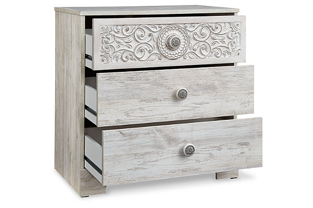 If it’s coastal chic or cottage quaint style you long for, the Paxberry whitewashed chest of drawers invites you to go to town. Its distinctive weatherworn finish conveys an easy-breezy sensibility, perfect for a restful bedroom retreat. Rest assured, tastefully edited lines and medallion drawer pulls give this attractively priced chest a high-end aesthetic.Made of engineered wood and decorative laminate | Whitewash replicated worn through paint with authentic touch | Hardware features a worn-through painted effect | 3 spacious smooth-gliding drawers; vinyl wrapped sides and back for extra durability | Safety is a top priority, clothing storage units are designed to meet the most current standard for stability, ASTM F 2057 (ASTM International) | Drawers extend out to accommodate maximum access to drawer interior while maintaining safety | Assembly required | Estimated Assembly Time: 25 Minutes