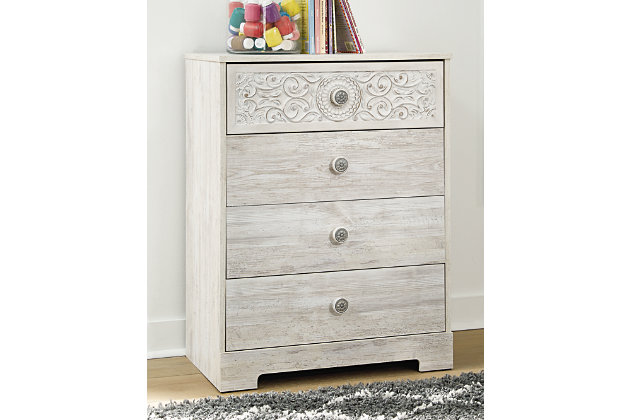 If it’s coastal chic or cottage quaint style you long for, the Paxberry whitewashed chest of drawers invites you to go to town. Its distinctive weatherworn finish conveys an easy-breezy sensibility, perfect for a restful bedroom retreat. Tastefully edited lines and medallion drawer pulls give this attractively priced chest a high-end aesthetic.Made of engineered wood and decorative laminate | Whitewash replicated worn through paint with authentic touch | Hardware features a worn-through painted effect | 4 spacious smooth-gliding drawers; vinyl wrapped sides and back for extra durability | Safety is a top priority, clothing storage units are designed to meet the most current standard for stability, ASTM F 2057 (ASTM International) | Drawers extend out to accommodate maximum access to drawer interior while maintaining safety | Assembly required | Estimated Assembly Time: 35 Minutes