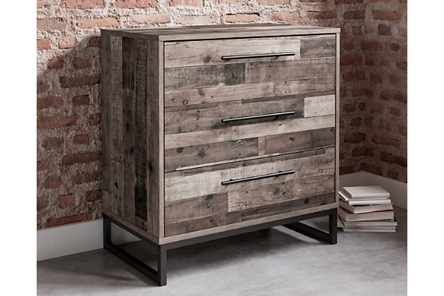 Streamlined design and a stunning finish come together in one simply extraordinary piece. The Neilsville chest of drawers is sure to impress with three smooth-operating drawers, canted metal legs and a rich brown finish over replicated pine grain texture. Its mid-century style is a nod to the past, while the updated finish keeps it solidly in the present.Made with engineered wood (MDF/particleboard) and decorative laminate | Rustic butcher block finish over replicated pine grain with authentic touch | Metal legs with a dark brown finish | Dark pewter-tone linear handles | 3 smooth-gliding drawers with vinyl-wrapped sides and back | Safety is a top priority, clothing storage units are designed to meet the most current standard for stability, ASTM F 2057 (ASTM International) | Drawers extend out to accommodate maximum access to drawer interior while maintaining safety | Assembly required | Estimated Assembly Time: 25 Minutes