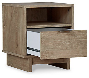 Bringing big style to small living areas, the Oliah nightstand is a smart, space-saving choice for those with an eye for contemporary design. Its clean-lined profile and understated refinements create such a simple silhouette that works in so many settings. A flush-mount drawer and open cubby keep this nightstand on the cutting edge of cool.Made of engineered wood (MDF/particleboard) and decorative laminate | Dry, light finish with replicated oak grain and authentic touch | Smooth-gliding drawer; vinyl wrapped sides and back for extra durability; open cubby | Brushed nickel-tone tab pull | Assembly required | Estimated Assembly Time: 25 Minutes