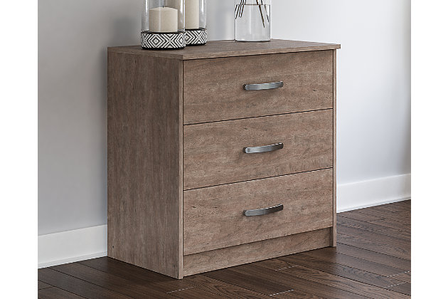 If you’re a fan of clean, crisp and contemporary interiors, rest assured the Flannia 3-drawer chest suits you. The linear profile and flush-mount drawers are enhanced with a warm gray vintage finish with subtle pearl effect over replicated cherry grain. Large satin nickel-tone pulls are an artful touch. Hard to believe such a high-style aesthetic can be so attractively priced.Made of engineered wood (MDF/particleboard) and decorative laminate | Warm gray vintage finish with subtle pearl effect over replicated cherry grain | Satin nickel-tone hardware | 3 smooth-gliding drawers | Vinyl wrapped drawer sides and back for durability | Safety is a top priority, clothing storage units are designed to meet the most current standard for stability, ASTM F 2057 (ASTM International) | Drawers extend out to accommodate maximum access to drawer interior while maintaining safety | Assembly required | Estimated Assembly Time: 25 Minutes