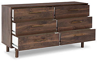 At the intersection of industrial cool and chic sophistication you’ll find the Calverson dresser. The rich brown finish over replicated walnut wood grain and burnished goldtone handles offer an authentic touch that plays well any way you style it. Simple and elegant in its design, this piece keeps your home decor grounded while elevating your modern style.Made of engineered wood and decorative laminate | Rich brown finish over replicated walnut wood grain with authentic touch | Burnished goldtone pulls | 6 smooth-gliding drawers | Vinyl wrapped drawer sides and back for extra durability | Safety is a top priority, clothing storage units are designed to meet the most current standard for stability, ASTM F 2057 (ASTM International) | Drawers extend out to accommodate maximum access to drawer interior while maintaining safety | Assembly required | Estimated Assembly Time: 55 Minutes