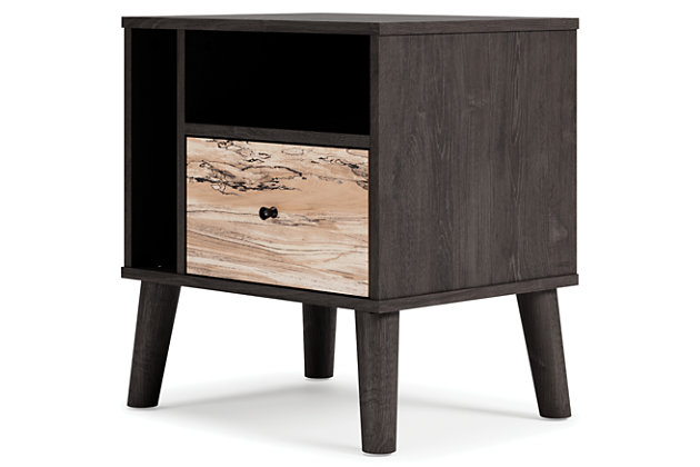 The perfect marriage of contemporary and casual style, the Piperton nightstand is a charming addition to your home. It features an expressive two-toned look, with a dark charcoal finish over replicated oak grain with an authentic touch and a replicated sugarberry wood grain. Matte black knobs and splay legs add a finishing touch, while the open shelving allows for extra storage.Made of engineered wood (MDF/particleboard) and decorative laminate | Two-toned with dark charcoal finish over replicated oak grain and a replicated sugarberry wood grain | 1 smooth-gliding drawer with vinyl wrapped sides and back | Matte black knobs | Open shelving | Splay legs | Assembly required | Estimated Assembly Time: 25 Minutes