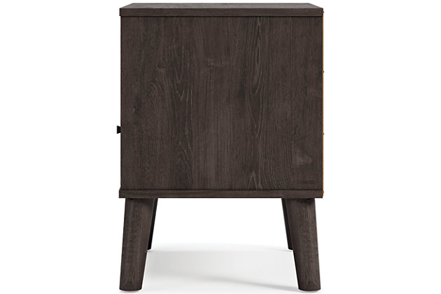 The perfect marriage of contemporary and casual style, the Piperton nightstand is a charming addition to your home. It features an expressive two-toned look, with a dark charcoal finish over replicated oak grain with an authentic touch and a replicated sugarberry wood grain. Matte black knobs and splay legs add a finishing touch, while the open shelving allows for extra storage.Made of engineered wood (MDF/particleboard) and decorative laminate | Two-toned with dark charcoal finish over replicated oak grain and a replicated sugarberry wood grain | 1 smooth-gliding drawer with vinyl wrapped sides and back | Matte black knobs | Open shelving | Splay legs | Assembly required | Estimated Assembly Time: 25 Minutes