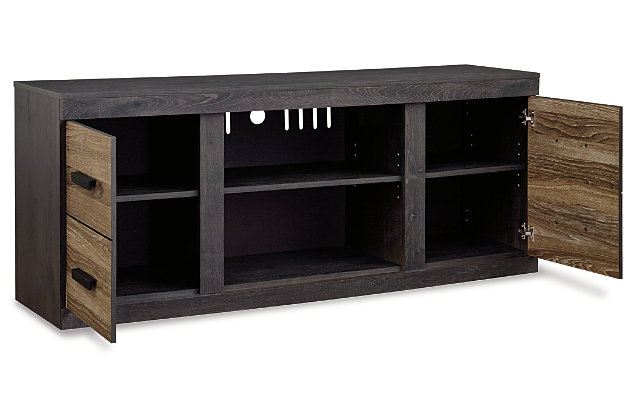 The Harlinton TV stand’s sleek lines and two-tone finish fit right in with your big picture scheme. Beautifully “weathered” treatment of the inlaid plank-style boards has a “reclaimed” urban quality. Stow away video paraphernalia and audio essentials in the roomy cabinets. Opt for the optional fireplace insert (sold separately) for added warmth.Made with engineered wood (MDF/particleboard) and decorative laminate | Warm gray vintage finish with a white wax effect | Vintage aged black/brown finish over replicated oak grain | Matte black hardware | 2 cabinets; each with an adjustable shelf | Compatible with W100-101 and W100-02 electric fireplace inserts | Cutouts for wire management and venting for heat | Assembly required | Estimated Assembly Time: 50 Minutes