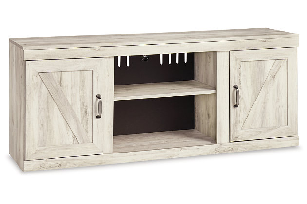 Express your modern farmhouse style with the Bellaby TV stand with fireplace option. Wispy white finish over replicated oak wood grain is a delightful change from the ordinary. Clean-lined, classic styling with barn door inspiration provides a country chic aesthetic that’s a breath of fresh air.Made with engineered wood (MDF/particleboard) and decorative laminate | Wispy white finish over replicated oak grain with authentic touch | One open storage area and 2 single-door storage areas (each with adjustable/removable shelf) | Cutouts for wire management and ventilation | Compatible with W100-02 and W100-101 LED fireplace inserts (sold separately) | Assembly required | Estimated Assembly Time: 50 Minutes