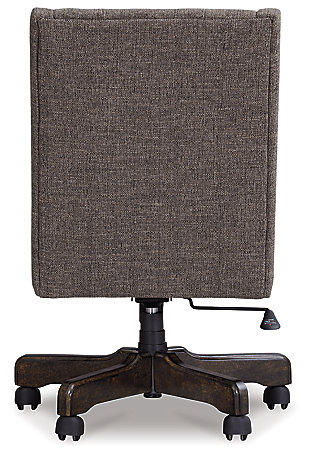 You deserve a touch of indulgence—especially when you’re hard at work. That’s what makes this upholstered swivel desk chair so alluring. Covered in a textured graphite fabric with button tufting and wingback flair, it’s a desk chair that makes work look a lot more pleasurable.Smooth 360-degree swivel | Metal, plastic and wood base | Casters for easy movement | Cushioned seat with button-tufted polyester upholstery | Adjustable seat height with manual tilt | Assembly required | Estimated Assembly Time: 15 Minutes
