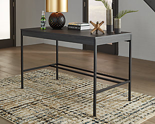 Elevate your home office with the simply sensational Yarlow home office desk. Pairing a dark wood grain look with tubular black metal base for modern appeal, this minimalistic desk with ample work space is dressed to impress in a no-muss, no-fuss way.Made of engineered wood and decorative laminate | Replicated dark wood grain finish | Black matte metal legs | Stretcher styling | Assembly required | Estimated Assembly Time: 30 Minutes