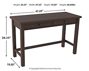 Whether you lean towards modern farmhouse or urban industrial design, the clean-lined profile of the Camiburg 2-drawer desk is an essential component to any well-equipped home office. Sleek and slim, it’s just enough furniture to complete your space without overloading your look.Made of engineered wood and decorative laminate | Replicated rough-sawn wood grain | 2 smooth-operating drawers with ball bearing side glides | Designed for easy cord management | Assembly required | Estimated Assembly Time: 15 Minutes