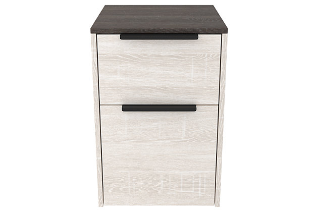 More than just a beauty to behold, the Dorrinson home office file cabinet is designed to raise your productivity by packing more work area into less space. Sporting a replicated gray wood top with an antiqued white base, it’s ready to take a cool stance for modern farmhouse style. Pair with the desk or bookcase (each sold separately) for a well-organized home office.Made of engineered wood and laminated paper | Two-tone treatment; replicated gray wood top with antiqued white base | 2 smooth-operating file drawers with ball bearing side glides | Assembly required | Estimated Assembly Time: 60 Minutes