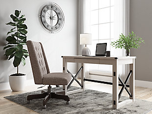 Love an urban farmhouse aesthetic? Make it work to your advantage with the beautifully styled Bayflynn desk. This simply striking choice in home office furniture has an unmistakable farmhouse feel thanks to design elements including a whitewashed decorative wood grain laminate contrasted with cross-buck rails, metal accents and a stretcher in black. Perfect for office supplies, the desk includes a handy center drawer with hardware-less aesthetic to help keep your desk top clutter free.Made of engineered wood | Decorative wood grain laminate in whitewashed tone | Cross-buck rails, metal accents and stretcher in contrasting black iron tone | Center drawer with metal ball bearing side glides | Assembly required | Estimated Assembly Time: 60 Minutes