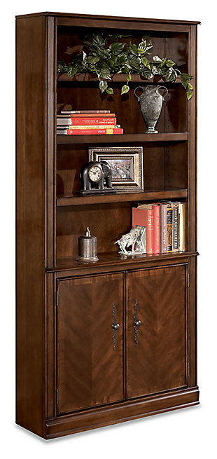 When you mix stately, traditional style with a European flair, you’ve got something special. Case in point: the Hamlyn door bookcase. Simply beautiful, it’s bathed in a richly colored finish for rustic warmth and high-end appeal. Shelving storage behind the dual doors is especially convenient.Hand-finished | Made of veneers, wood and engineered wood | Assembly required | 2 cabinets, each with 1 adjustable shelf | 3 adjustable shelves | Antiqued bronze-tone hardware | Excluded from promotional discounts and coupons