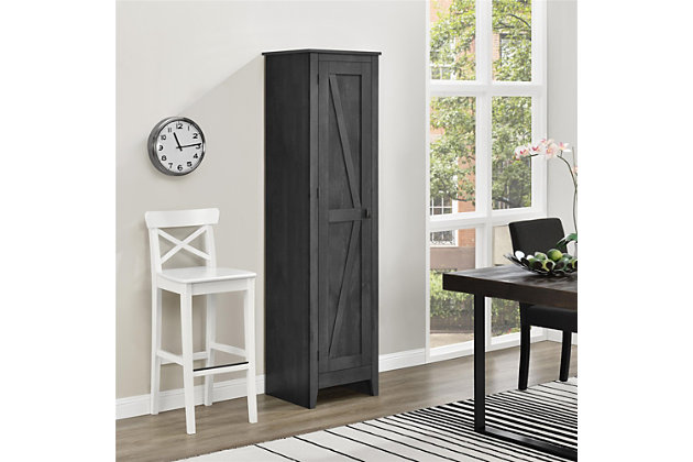 It’s time to get your house in order—organizationally and decoratively. The rustic style of this bookcase with doors brings a modern country appeal to your space. Reminiscent of a weathered barn, this casual piece opens to reveal four shelves perfect for storing office supplies, extra linens, seasonal clothing and more.Made of laminated engineered wood | Weathered gray/brown finish | 4 shelves (2 adjustable) | Wall anchor kit included | Assembly required (2 adults recommended)