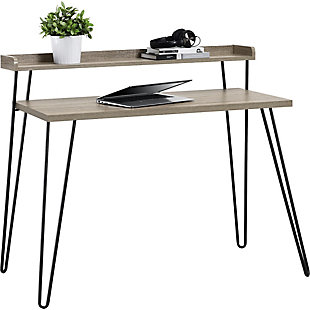With a mix of industrial and urban styles, this desk has a small footprint but affords two levels of storage—perfect for tight spaces. With hairpin legs that harken back to mid-century design, this standout piece lends great functionality and looks incredibly cool doing so.Made of laminated engineered wood and powdercoated metal | Light walnut woodgrain finish | Metal hairpin legs | Assembly required