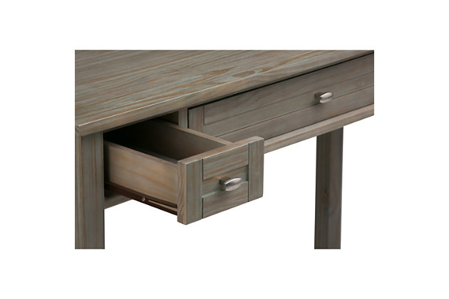 Ready for a home office refresh? Shake things up in a timeless way with this Shaker-inspired desk. Crafted with sturdy pine wood, beautified with a distressed driftwood gray finish, it simply makes sense with a drop-front keyboard tray and dual storage drawers for organizing office supplies.DIMENSIONS: 20" D x 48" W x 31.5" H | Handcrafted with care using the finest quality solid wood | Hand-finished with a Distressed Grey finish and a protective NC lacquer to accentuate and highlight the grain and the uniqueness of each piece of furniture. | Multipurpose desk adds function and style without overwhelming the space. Looks great in your living room, family room, home office, bedroom or condo. Provides plenty of space for office work, studying, writing or gaming | Features two side storage drawers with metal drawer glides and a flip down central drawer front with internal keyboard tray | Transitional Style features shaker style drawers, Brushed Nickel knobs, square tapered legs and square edged table top | Assembly required | We believe in creating excellent, high quality products made from the finest materials at an affordable price. Every one of our products come with a 1-year warranty and easy returns if you are not satisfied.