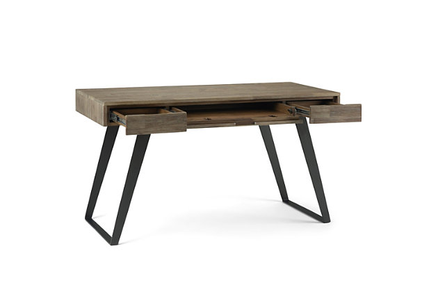 Make it work in a simply striking way with this 54" industrial desk. Handcrafted with solid acacia wood and sturdy metal, this two-tone desk masters the art of simplicity with a flip-down, pull-out keyboard tray and discreet hand pulls on the pair of drawers for clean, urban design. Distressed gray top includes a protective lacquer to accentuate the beauty and uniqueness of the grain. Sleek black metal legs are cool from every angle.Made of acacia wood, engineered wood and metal | Hand-finished top in distressed gray with protective lacquer to highlight the wood grain | Black metal legs | 2 drawers with metal glides | Flip-down, pull-out keyboard tray | Assembly required
