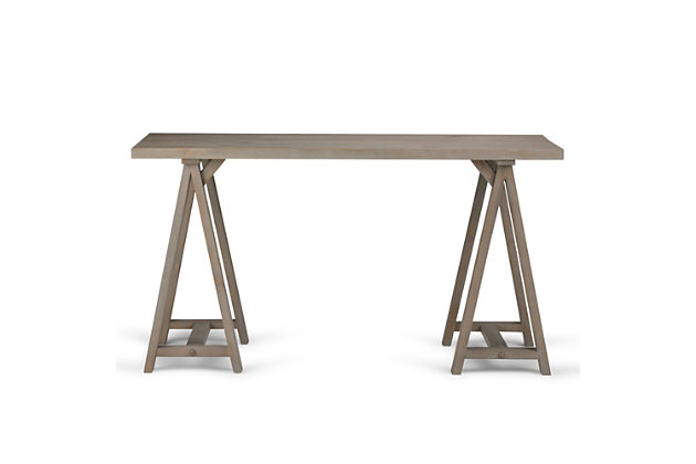 Make it work in a simply striking way with this 56" sawhorse industrial desk. Handcrafted of solid pine wood that’s beautified with a distressed gray finish, this desk masters the art of simplicity with its clean, uncluttered flair, extra thick tabletop and sturdy sawhorse supports. What an inspired choice for modern farmhouses and industrial-hip spaces.DIMENSIONS: 24" d x 56" w x 30" h | Handcrafted with care using the finest quality solid wood | Hand-finished with a Distressed Grey finish and a protective NC lacquer to accentuate and highlight the grain and the uniqueness of each piece of furniture. | Multipurpose desk adds function and style without overwhelming the space. Looks great in your living room, family room, home office, bedroom or condo. Provides plenty of space for office work, studying, writing or gaming | Features a spacious, simple, extra thick table top surface and sturdy sawhorse supports | Style evokes an era long past with its industrial style roots and retro design elements; the collection is based on the utilitarian furnishings found in workshops of handymen, craftsmen and carpenters | Assembly required | We believe in creating excellent, high quality products made from the finest materials at an affordable price. Every one of our products come with a 1-year warranty and easy returns if you are not satisfied.