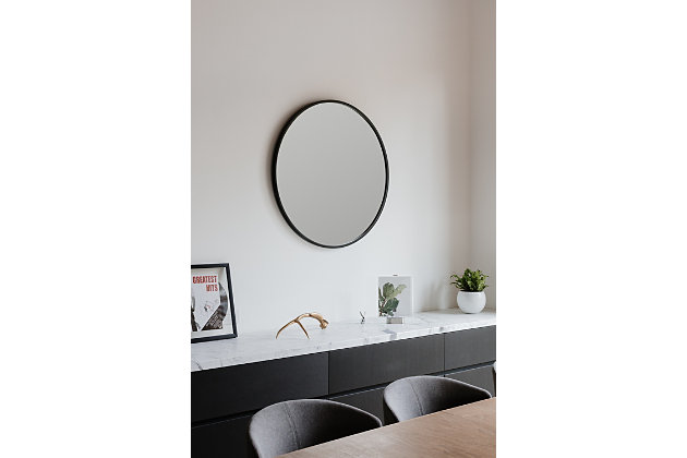 See what you’ve been missing with the uniquely chic Hub black round wall mirror. Its innovative rubber frame looks cool and provides a protective bumper, making it ideal for high-traffic areas. The reflective surface of this generously sized 37" round mirror makes the most of natural light so your space feels bigger and brighter.Black rubber frame | Mirrored glass | Fashionable and forgiving rubber frame ideal for high-traffic areas | 37" in diameter | Ready to hang