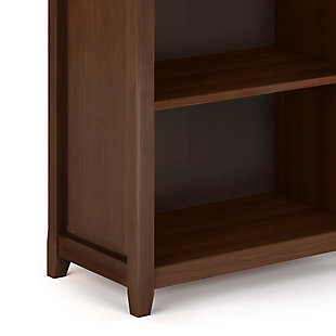 Quality crafted of solid wood, this simply stri bookcase by Simpli Home makes itself at home with handcrafted details and a timeless russet brown finish. And with four adjustable shelves, it’s designed to suit your storage and display needs, whether your plans include organizing your book or CD collection or showcasing home accents.70" bookcase | Made of pine wood | Handcrafted | Russet brown finish with protective NC lacquer to accentuate the grain | Transitional style | 4 adjustable shelves; 1 fixed shelf | Assembly required