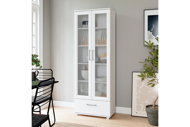 The Serra 1.0 display closet is the perfect option to store and display books, photos, collectibles, trophies, china and silverware. This modern, functional unit can be placed in the living room, dining room, bedroom or office. With two long glass doors, your objects can have a museum-display look. A bottom drawer conceals and stores additional items.Includes 2 frosted glass doors | 5 shelves | 1 bottom drawer | Freestanding closet with closed mop base | White finish | Made with wood | Assembly required