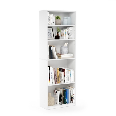 White tall bookcase filled with books and decor