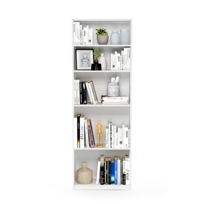 White tall bookshelf with books and decor in a modern living room