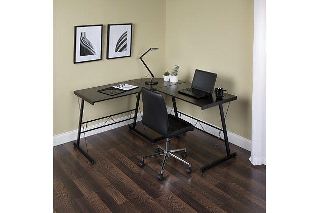 The OFM Essentials Collection is where quality meets value. This industrial modern 60" L-Shaped Desk, Corner Computer Desk, in Black, is perfect for er office spaces and home offices. Featuring a particle board core surrounded by high-quality melamine laminate, the 3/4" thick woodgrain top will wear well and complement your decor. The desk's accent metal legs have a powder coated paint finish, in Black, for durability and adjustable glides for easy surface leveling. The desk is 60" L x 23.625" D Left - 60" L x 23.625" D Right – 29" H.Industrial modern L - shaped desk |  footprint perfect for home and er offices | High quality melamine laminate top | Powder coated industrial metal accent frame | Adjustable glides | OFM Limited Warranty
