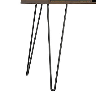 Add some mid-century style to your space with the Novogratz Concord Computer Desk with Storage. Inspired by mid-century design, the classic medium brown woodgrain finish on the laminated particleboard pairs with the black metal hairpin legs for a retro twist. The minimalistic design makes this Desk a perfect addition to your dorm room or small apartment. The desktop is large enough for you to work from home or browse social media on your laptop. The open cubby allows you to store notebooks, writing utensils, and papers off of the desktop but still within reach to keep your workspace clutter free. The convenient drawer is perfect for storing away extra office supplies. The back of the desk features an open cubby that is perfect for hiding a power strip. The Desk ships flat to your door and assembly is required upon opening. Two adults are recommended to assemble. Once assembled, the Desk measures to be 30.75”H x 41.61”W x 19.69”D.Give your workspace a mid-century modern upgrade with the novogratz concord computer desk with storage | Made of laminated particleboard, the medium brown woodgrain finish pairs with the black metal hairpin legs for a retro twist | Desktop is spacious enough for your laptop and office supplies. The open cubby and drawer allows you to keep notebooks, paper, and office supplies within reach and off of your workspace | The open cubby in the back of the desk is the perfect hiding spot for a power strip | The desk ships flat to your door and 2 adults are recommended to assemble. The desktop can support up to 75 lbs. The open cubby can hold up to 15 lbs. While the drawer can hold 10 lbs. Assembled dimensions: 30.75”h x 41.61”w x 19.69”d | Complete your room with other items from the concord collection for a coordinated look (sold separately) | 1 year limited warranty included