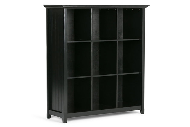 You've been avoiding going into those rooms in your home which are cluttered with books, office supplies, favorite mementos and decor pieces...we can help with that. The Acadian Nine Cube Storage Unit provides the ultimate solution for all of your storage needs. Display your books and decorative accents on dedicated display space for a clean, distinctive cubby look. The stable, attractive design has nine fixed shelves that have exceptional structural strength and durability.; Efforts are made to reproduce accurate colors, variations in color may occur due to computer monitor and photography; At Simpli Home we believe in creating excellent, high quality products made from the finest materials at an affordable price. Every one of our products come with a 1-year warranty and easy returns if you are not satisfiedDIMENSIONS: 15.75" d x 44" w x 48" h | Handcrafted with care using the finest quality solid wood | Hand-finished in Black with a protective NC lacquer | Features twelve (12) large storage cubbies for storage of objects of all shapes and sizes | Multipurpose  unit offers plenty of functional storage. Looks great in your living room, entryway, bedroom, condo or office | Transitional style includes elegantly tapered legs, grooved sides and molded crown edged table top | Assembly Required | We believe in creating excellent, high quality products made from the finest materials at an affordable price. Every one of our products come with a 1-year warranty and easy returns if you are not satisfied.