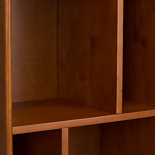Display your favorite books and keepsakes in the Draper Mid Century Bookcase with Storage. This piece is crafted from solid hardwood and combines a mid-century modern design with function. The Draper Mid Century Bookcase with Storage features six shelves and a drawer providing the ultimate solution for all your storage needs. This bookcase delivers a clean lined, contemporary feel to your living room, family room or home office.; Efforts are made to reproduce accurate colors, variations in color may occur due to computer monitor and photography; At Simpli Home we believe in creating excellent, high quality products made from the finest materials at an affordable price. Every one of our products come with a 1-year warranty and easy returns if you are not satisfiedDIMENSIONS: 14" d x 22" w x 64" h | Handcrafted using the finest quality solid rubberwood hardwood | Hand-finished with a rich Teak Brown stain and a protective NC lacquer to accentuate and highlight the grain and the uniqueness of each piece of furniture | Features six (6) shelving compartments and a drawer for storage with recessed drawer pull in an antique brass hardware finish and anti-tip hardware | Multipurpose unit offers plenty of functional storage, looks great in your living room, bedroom, condo or office | Style evokes an era long past with its Mid-Century Modern style roots and retro design elements | Assembly Required | We believe in creating excellent, high quality products made from the finest materials at an affordable price. Every one of our products come with a 1-year warranty and easy returns if you are not satisfied.