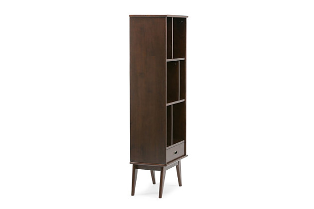 Display your favorite books and keepsakes in the Draper Mid Century Bookcase with Storage. This piece is crafted from solid hardwood and combines a mid-century modern design with function. The Draper Mid Century Bookcase with Storage features six shelves and a drawer providing the ultimate solution for all your storage needs. This bookcase delivers a clean lined, contemporary feel to your living room, family room or home office.; Efforts are made to reproduce accurate colors, variations in color may occur due to computer monitor and photography; At Simpli Home we believe in creating excellent, high quality products made from the finest materials at an affordable price. Every one of our products come with a 1-year warranty and easy returns if you are not satisfiedDIMENSIONS: 14" d x 22" w x 64" h | Handcrafted using the finest quality solid rubberwood hardwood | Hand-finished with a Medium Auburn Brown stained and glazed finish with a protective NC lacquer to accentuate and highlight the grain and the uniqueness of each piece of furniture | Features six (6) shelving compartments and a drawer for storage with recessed drawer pull in an antique brass hardware finish and anti-tip hardware | Multipurpose unit offers plenty of functional storage, looks great in your living room, bedroom, condo or office | Style evokes an era long past with its Mid-Century Modern style roots and retro design elements | Assembly Required | We believe in creating excellent, high quality products made from the finest materials at an affordable price. Every one of our products come with a 1-year warranty and easy returns if you are not satisfied.