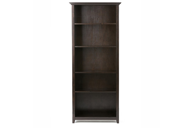The clutter is sometimes overwhelming; books, CD's, mementos, vases, photos, sculptures, office supplies, decor pieces... The list is endless. This piece was designed for convenience and versatility with a 70 inch height and adjustable shelves. The Amherst Bookcase, has five shelves providing the ultimate solution for all of your storage needs. Display your books and decorative accents on a dedicated display space. With tapered legs, molded top, and rich Hickory Brown wood stain the design of this unit enhances the appearance of all your items.; Efforts are made to reproduce accurate colors, variations in color may occur due to computer monitor and photography; At Simpli Home we believe in creating excellent, high quality products made from the finest materials at an affordable price. Every one of our products come with a 1-year warranty and easy returns if you are not satisfiedDIMENSIONS: 14" D x 30" W x 70" H; Handcrafted with care using the finest quality solid wood | Hand-finished with a Hickory Brown stain and protective NC lacquer coating to accentuate and highlight the grain and the uniqueness of each piece of furniture | Features four (4) adjustable shelves for versatile storage and one (1) fixed shelf; Assembly Required | Multipurpose unit offers plenty of functional storage. Looks great in your living room, bedroom, condo or office; Transitional design includes tapered legs and a molded crown edged table top
