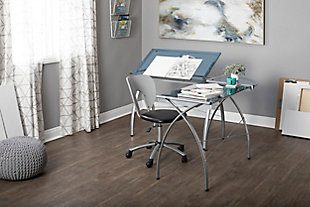 Studio Designs' Futura LS Work Center with Tilt includes a "three-in-one" desk space that complements any work setting. The sleek design of the two table and corner connector create a seamless desk top without taking up too much space. One of the tempered blue safety glass table tops can adjust in angle up to 45 degrees. Arrange the placement of tables to your liking during assembly. The Work Center can be used as a drafting or light table. Also featured is a 24'' pencil ledge that slides up and locks into place when needed as well as rear crossbars and floor levelers for stability. Made of durable powder-coated steel. Main work surface: 35.25''L x 20''D per table and 20'' x 20'' corner connector. Overall dimensions: 59''W x 59''D x 30''HOverall Dimensions: 59"W x 59"D x 30"H | Main Worksurface 35.25"W x 20"D x 2pcs | Top Angle Adjustment from Flat to 45 Degrees | Can be used as a Drafting Table and Light Table | 24" Slide Up Pencil Ledge | Corner Connector: 20" x 20" | Tilt Angle Top can be attached to the Left or Right Side | Powder Coated Steel for Durability | Rear Crossbar for Stability | Tempered Blue Safety Glass Top