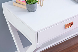 Make work fun with this campaign style Paige Writing Desk.  Finished in White with Rose Gold hardware, this desk will add color and life to any space.  Along with its timeless color the X-framed legs help keep the space sturdy.  Two drawers provide ample space for supplies.White finish | Two spacious storage drawers | Rose gold hardware | Some assembly required | Wipe clean with a damp cloth