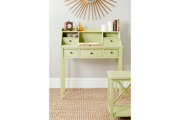 Get organized with help from the Landon 5-drawer writing desk. In vintage casual style, this attractive desk fast-forwards the old-fashioned roll top desk into the 21st century with a chic green finish. Use it in a home office, bedroom, den, or perhaps in the kitchen as the kids' workstation. Its drawers and storage cubbies provide space for keeping all of your essentials within reach.Made of wood and engineered wood | Split pea finish | Zinc-tone hardware | 5 drawers, 2 storage cubbies, top shelf | Assembly required