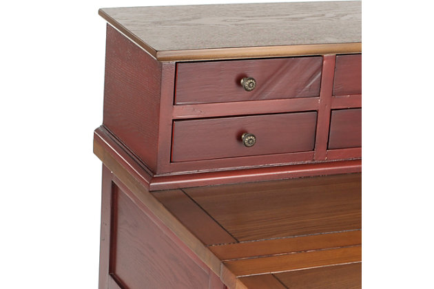 Work in style and convenience with the Abigail 7-drawer fold down desk. Modeled after an antique roll top desk, but with 21st century appeal, this desk is charming and functional. Its fold-down top gives you the option of opening up an instant workspace when needed. Six small drawers are ideal for organizing desk supplies and the large bottom drawer is handy for keeping notepads and more within reach. The honey oak writing surface beautifully contrasts with the cherry finish. Designed for small spaces, this desk is perfect for creating an instant office in the bedroom, kitchen, guest room or anywhere in between.Made of veneers, wood and engineered wood | Egyptian red oak finish | Zinc-tone hardware | Fold-down top, 7 drawers | Assembly required
