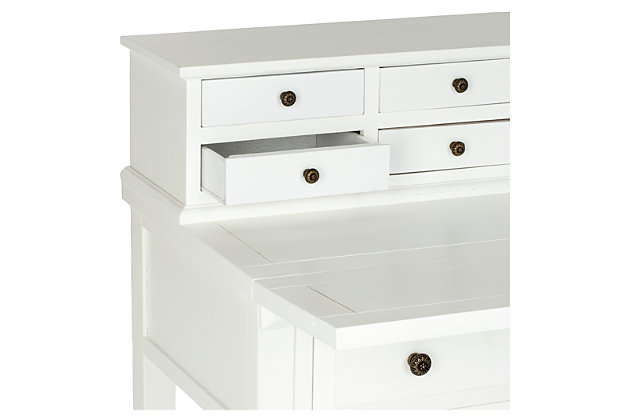 Work in style and convenience with the Abigail 7-drawer fold down desk. Modeled after an antique roll top desk, but with 21st century appeal, this desk is charming and functional. Its fold-down top gives you the option of opening up an instant workspace when needed. Six small drawers are ideal for organizing desk supplies and the large bottom drawer is handy for keeping notepads and more within reach. You'll love the painted white finish, which is steeped in traditional style. Designed for small spaces, this desk is perfect for creating an instant office in the bedroom, kitchen, guest room or anywhere in between.Made of veneers, wood and engineered wood | White finish | Zinc-tone hardware | Fold-down top, 7 drawers | Assembly required