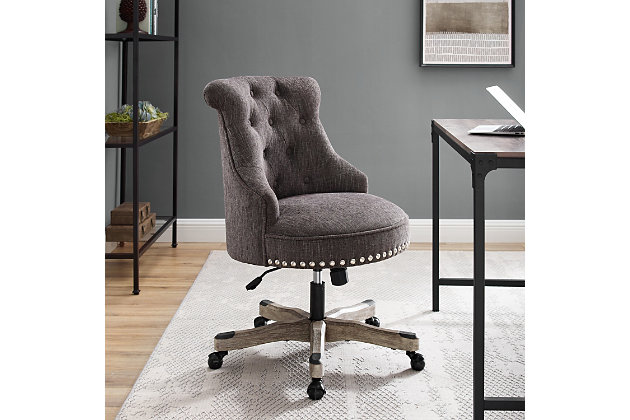 Work comfortably in the vintage beauty of this plush office chair. Upholstered in a charcoal gray fabric, this seat has a beautiful button tufted back with silvertone nailheads. A washed wood finish base has metal casters for ease of mobility. This chair is sure to bring eye-catching interest and function to any work area—perfect for a home work space or the office.Made of pine wood and rubberwood | Wood base with washed finish | Metal casters | Polyester upholstery | Button-tufted back | Ca fire foam cushion | Gas lift mechanism for seat height adjustability with bifma standard | Silvertone nailhead trim