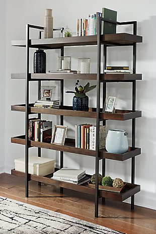 If you’re a fan of urban industrial design, it’s easy to see why the Starmore bookcase is a bestseller. The metal frame is sleek, sculptural and ultra modern. Beautified with an oiled walnut-tone finish, five gallery shelves stack up to great form and function.Shelves made with wood, acacia veneers and engineered wood | Metal frame with bronze-tone finish | 5 fixed shelves | Excluded from promotional discounts and coupons | Estimated Assembly Time: 30 Minutes
