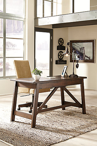 Leaning toward a casually cool look with a touch of rustic industrial flair? The Baldridge home office desk with canted legs takes a fresh stance on style. Two smooth-gliding drawers with dovetail construction reflect high quality that never goes out of fashion. Saw marks infuse a touch of rich distressing. Antiqued sculptural pulls provide the finishing touch.Made of veneers, wood and engineered wood | 2 smooth-gliding drawers with dovetail construction | Antiqued zinc-tone hardware | Desk top supported with cross stretcher brace design | Assembly required | Estimated Assembly Time: 45 Minutes