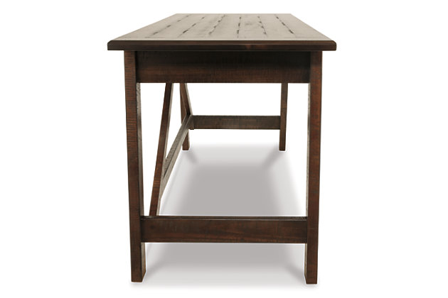 Leaning toward a casually cool look with a touch of rustic industrial flair? The Baldridge home office desk with canted legs takes a fresh stance on style. Two smooth-gliding drawers with dovetail construction reflect high quality that never goes out of fashion. Saw marks infuse a touch of rich distressing. Antiqued sculptural pulls provide the finishing touch.Made of veneers, wood and engineered wood | 2 smooth-gliding drawers with dovetail construction | Antiqued zinc-tone hardware | Desk top supported with cross stretcher brace design | Assembly required | Estimated Assembly Time: 45 Minutes