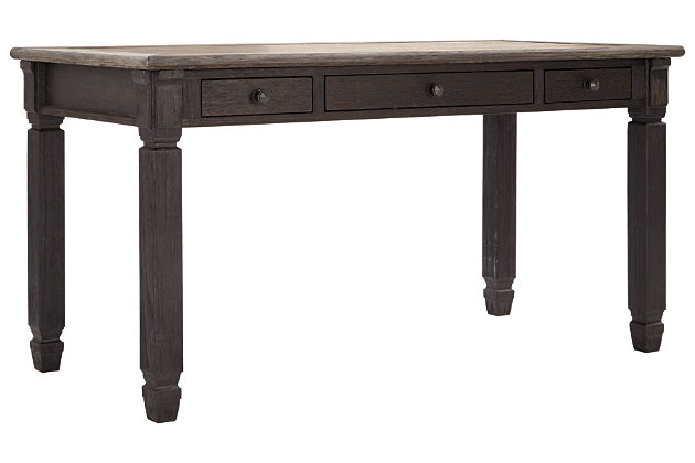 Shabby chic with a hint of down home country is what gives the Tyler Creek desk standout style. Appealing to today’s more relaxed sensibilities, its richly rustic two-tone effect blends a textured black finish with a weathered gray-brown top for an easy-elegant aesthetic. Three smooth-gliding drawers keep office essentials off your work surface and well within reach.Made of veneers, wood and engineered wood | Textured black and weathered gray-brown finishes | 3 smooth-gliding drawers | Antiqued bronze-tone knobs | Assembly required | Estimated Assembly Time: 30 Minutes