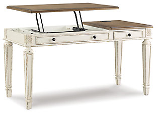 Elevating the art of traditional cottage styling, the Realyn desk is your heavenly home office realized. Antiqued two-tone aesthetic blends a chipped white with a distressed wood tone top for added charm. Framed drawer fronts, decorative corbels and elegantly turned and tapered legs add refinement, while dark bronze-tone knobs lend a classic touch. Spring lift top raises the surface to a comfortable standing position, for a healthy alternative. Built for looks and productivity, the built-in power supply and dual USB ports keep your devices close at hand and ready to go.Made of wood, engineered wood and veneers, with cast resin components | Antiqued two-tone finish | Smooth-gliding drawer with dovetail construction | Dark bronze-tone finished metal hardware | Includes AC power supply | USB charging | Spring lift top | Assembly required | Estimated Assembly Time: 15 Minutes
