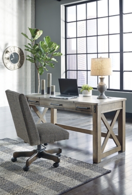 Crafted with pine veneers and wood treated to a distressed gray finish, the Aldwin lift top desk is rustic farmhouse living at its best. Crossbuck styling adds striking flair, while metal industrial brackets incorporate an industrial twist. Elevating the functionality of this lift top desk all the more: two smooth-gliding drawers and conveniently placed AC power/USB plug-ins.Made of pine veneers, pine wood and engineered wood | Distressed gray finish | Metal bracket accents | 2 smooth-gliding drawers with dovetail construction | 2 electrical outlets and 2 USB charging ports | Power cord included; UL Listed | Spring lift top | Assembly required | Estimated Assembly Time: 30 Minutes